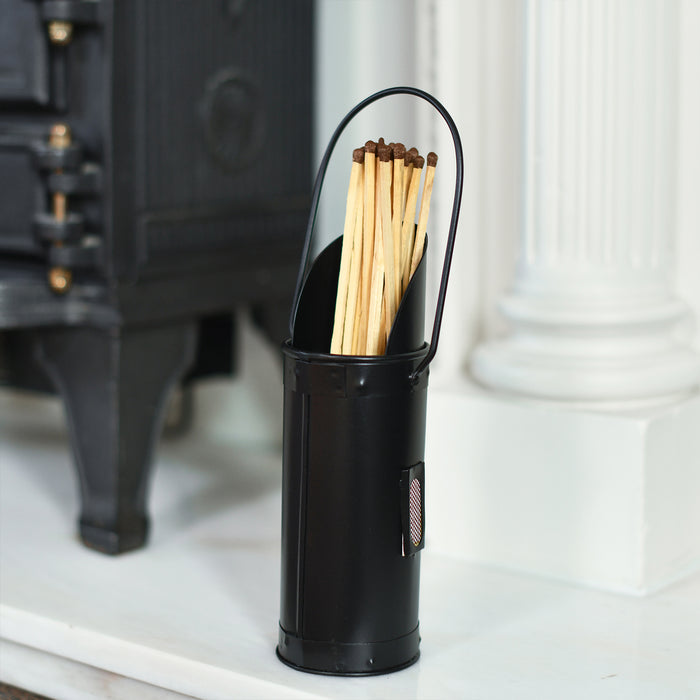 Black Matchstick Holder In Front Of Stove