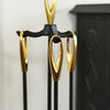 Close Up of Polished Brass Loop Handles and Stand