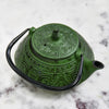 Green Teapot with Handle Down