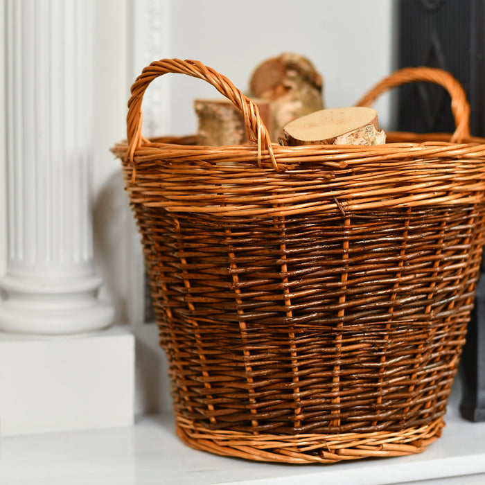 Log Basket With Logs In Against A White Background