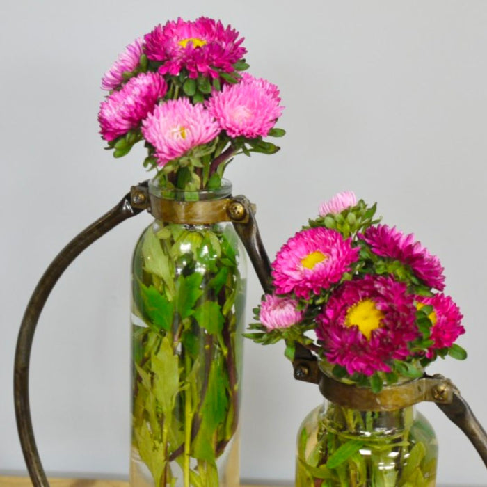 Close Up of Flowers in Industrial Vase 